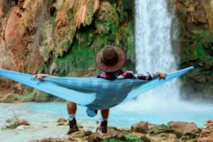 Man relaxing on hammock